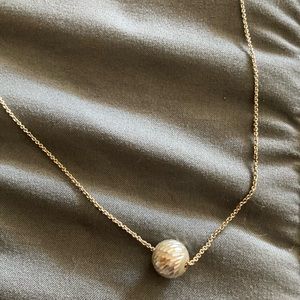 Faceted silver ball on 18” silver chain